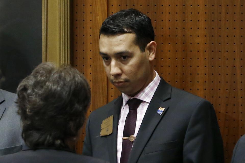 FILE - In this Wednesday, May 10, 2017 file photo, then-Arizona state Rep. Tony Navarrete, D-Phoenix, listens to a colleague on the floor of the at the Arizona Capitol Wednesday, May 10, 2017, in Phoenix. Currently, an Arizona State Senator, Navarrete has been arrested on suspicion of charges accusing him of sexual conduct with a minor, police said Friday, Aug. 6, 2021. (AP Photo/Ross D. Franklin, File)