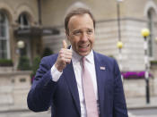 Britain's Health Secretary Matt Hancock gestures as he arrives at BBC Broadcasting House for his appearance on the current affairs programme, The Andrew Marr Show, in London, Sunday May 16, 2021. Cases of a virus variant first identified in India have more than doubled in a week, defying a sharp nationwide downward trend in infections won by months of restrictions and a rapid vaccination campaign. Hancock said the variant, formally known as B.1.617.2, is more transmissible than the U.K.’s main strain, and “it is likely it will become the dominant variant.” (Yui Mok/PA via AP)