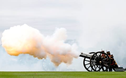 Members of the Kings Troop Royal Horse Artillery fire a First World War era 13-pounder field gun during a 41 gun Royal salute - Credit: ADRIAN DENNIS /AFP