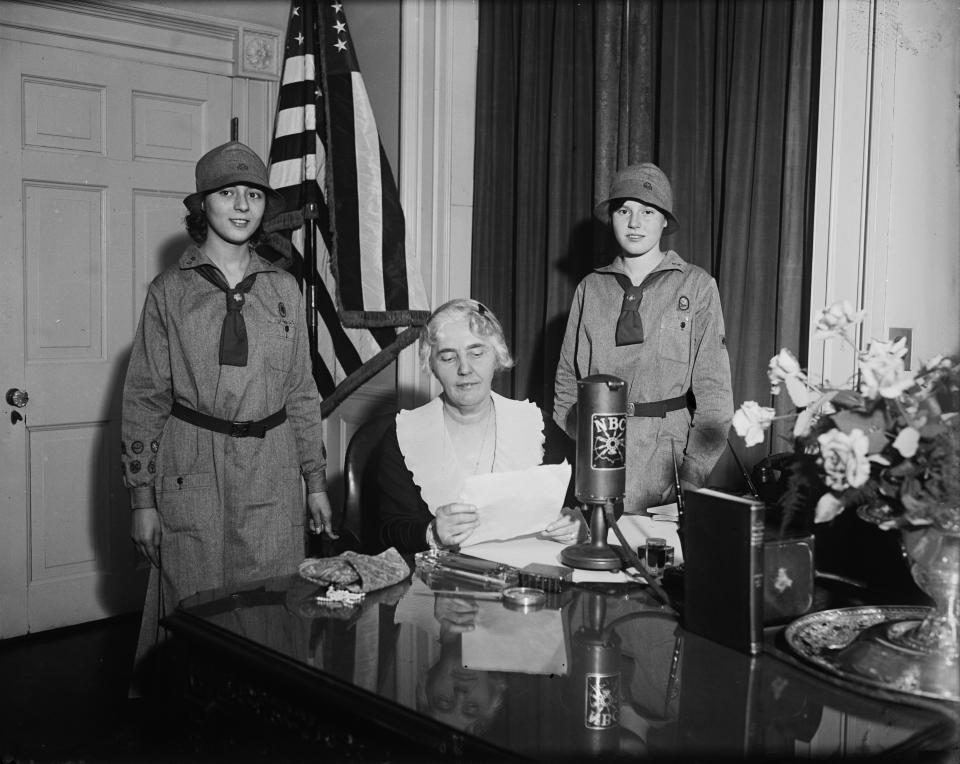 Lou Henry Hoover addressed the nation by radio on March 23, 1931 along with Girl Scouts Lois Kuhn (left) and Peggy Starr. She highlighted the work of women and girls in relief efforts in the Great Depression.