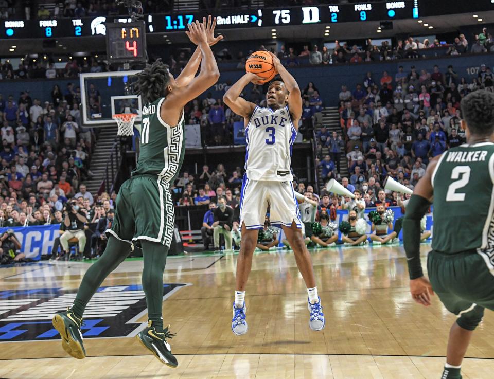 Duke University guard Jeremy Roach (3) shoots near Michigan State University guard A.J. Hoggard (11) during the second half of the NCAA Div. 1 Men's Basketball Tournament preliminary round game at Bon Secours Wellness Arena in Greenville, S.C. Sunday, March 20, 2022.