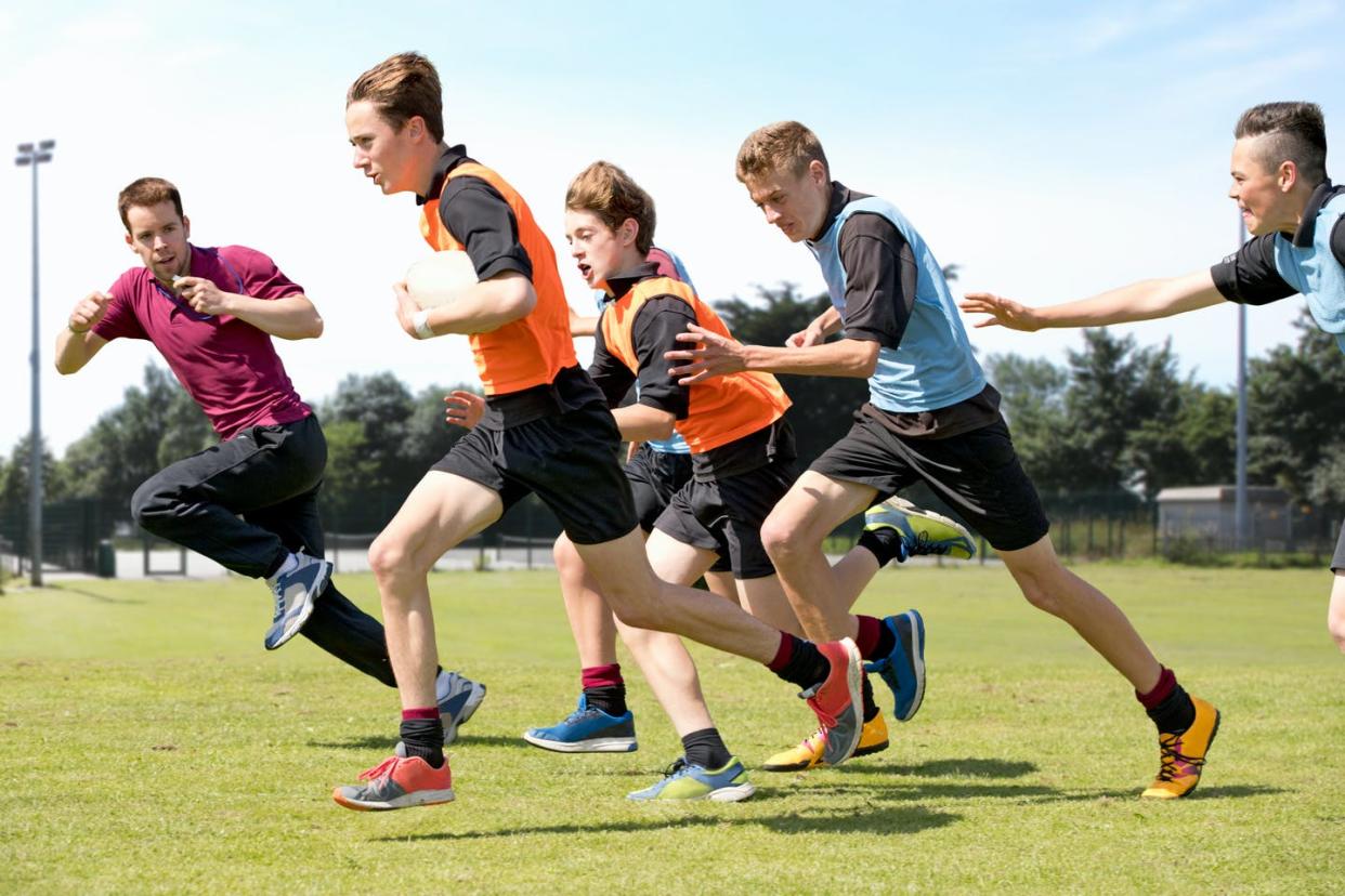   <span class="attribution"><a class="link " href="https://www.shutterstock.com/image-photo/middle-schoolboys-teacher-running-while-playing-1873346407" rel="nofollow noopener" target="_blank" data-ylk="slk:Shutterstock;elm:context_link;itc:0;sec:content-canvas">Shutterstock</a></span>