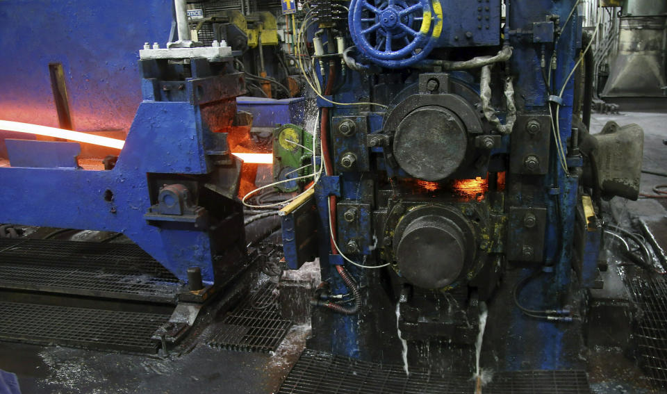 FILE - In this May 9, 2019, file photo, molten steel to make steel rods moves through the production line at the Gerdau Ameristeel mill in St. Paul, Minn. On Friday, June 14, the Federal Reserve reports on U.S. industrial production for April. (AP Photo/Jim Mone, File)