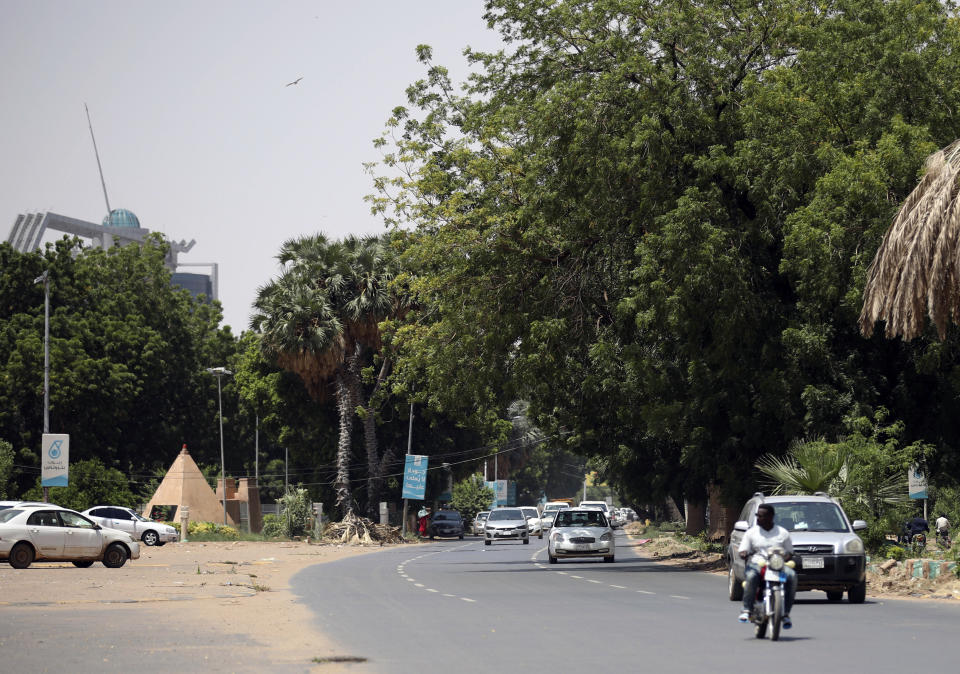 Traffic moves on a street in Sudan's capital Khartoum, Tuesday, Sept. 21, 2021. Sudanese authorities reported a coup attempt on Tuesday by a group of soldiers but said the attempt failed and that the military remains in control. The development underscored the fragility of Sudan’s path to democracy, more than two years after the military's overthrow of longtime autocrat Omar al-Bashir amid a public uprising against his three-decade rule. (AP Photo/Marwan Ali)