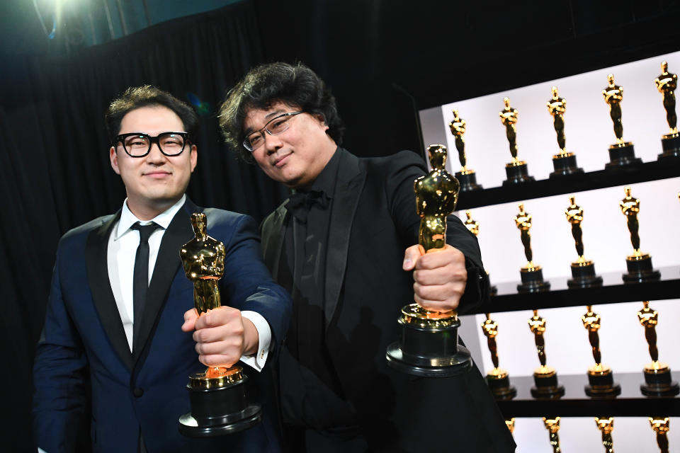 Best Original Screenplay award winners Han Jin Won and Bong Joon Ho pose backstage during the 92nd Annual Academy Awards at the Dolby Theatre on February 09, 2020 in Hollywood, California. (Photo by Richard Harbaugh - Handout/A.M.P.A.S. via Getty Images)