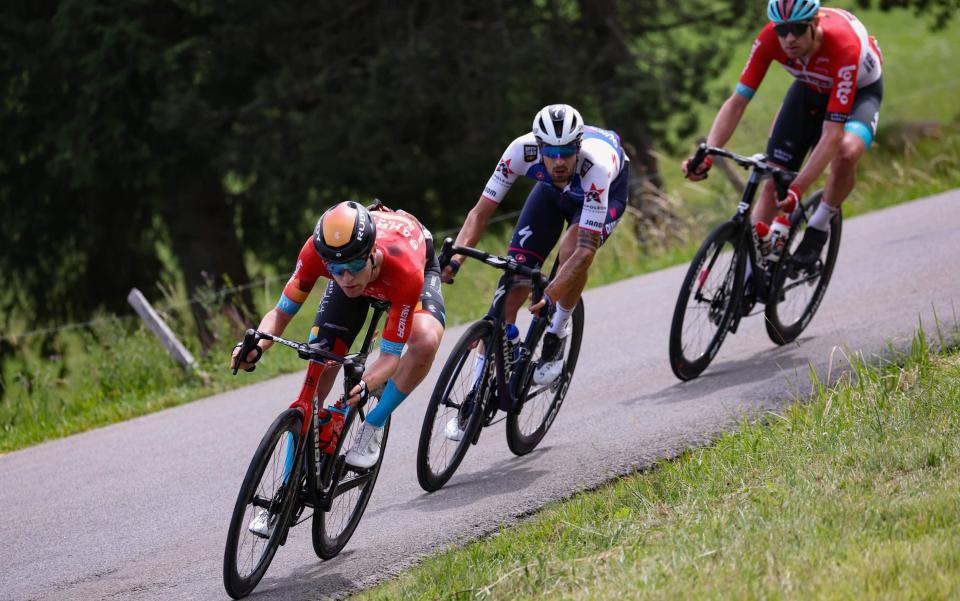 Fred Wright sits on the front of the three-man breakaway - GETTY IMAGES