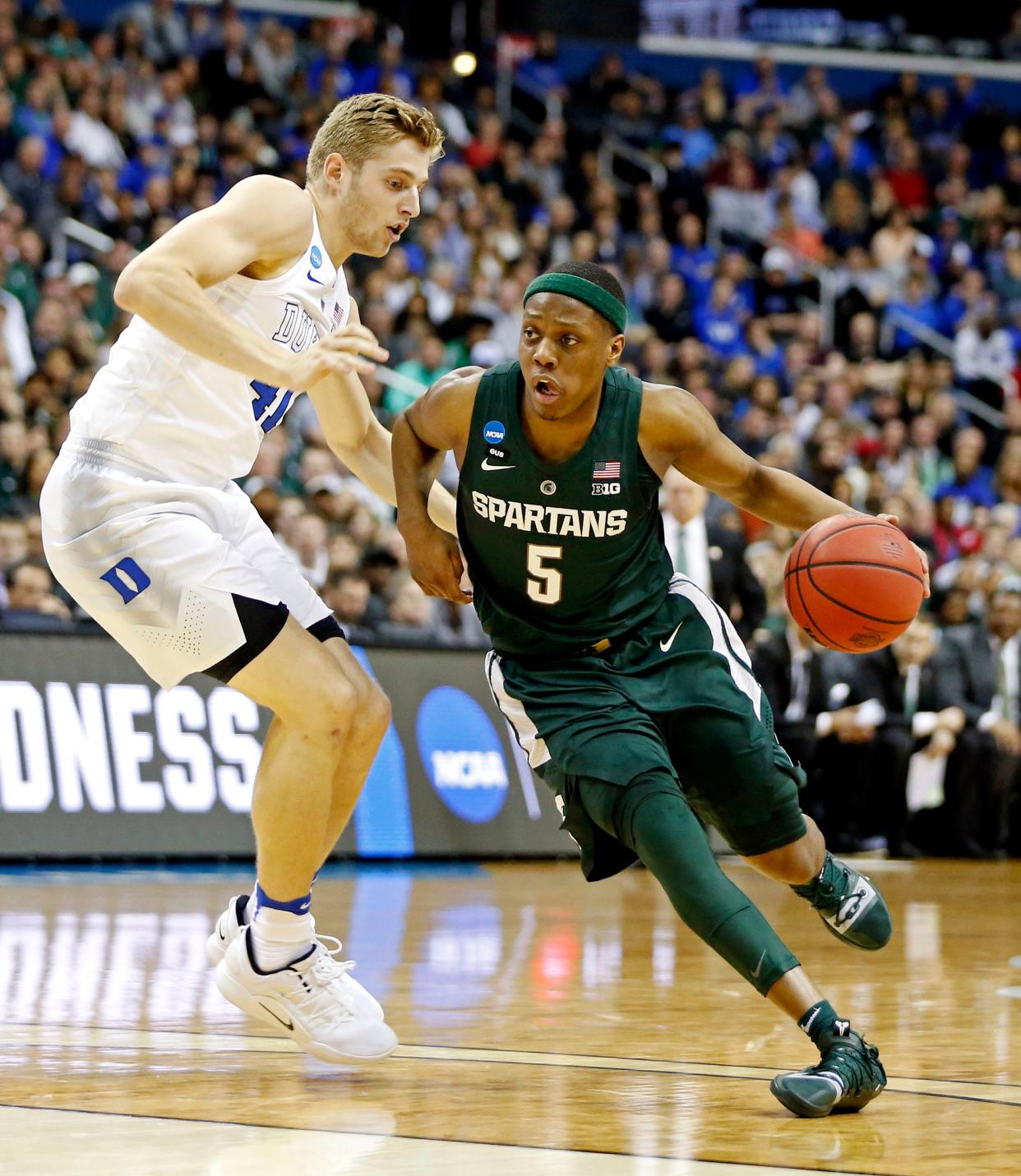 Mar 31, 2019; Washington, DC, USA; Michigan State Spartans guard Cassius Winston (5) drives to the basket against Duke Blue Devils forward Jack White (41) during the first half in the championship game of the east regional of the 2019 NCAA Tournament at Capital One Arena. Mandatory Credit: Amber Searls-USA TODAY Sports