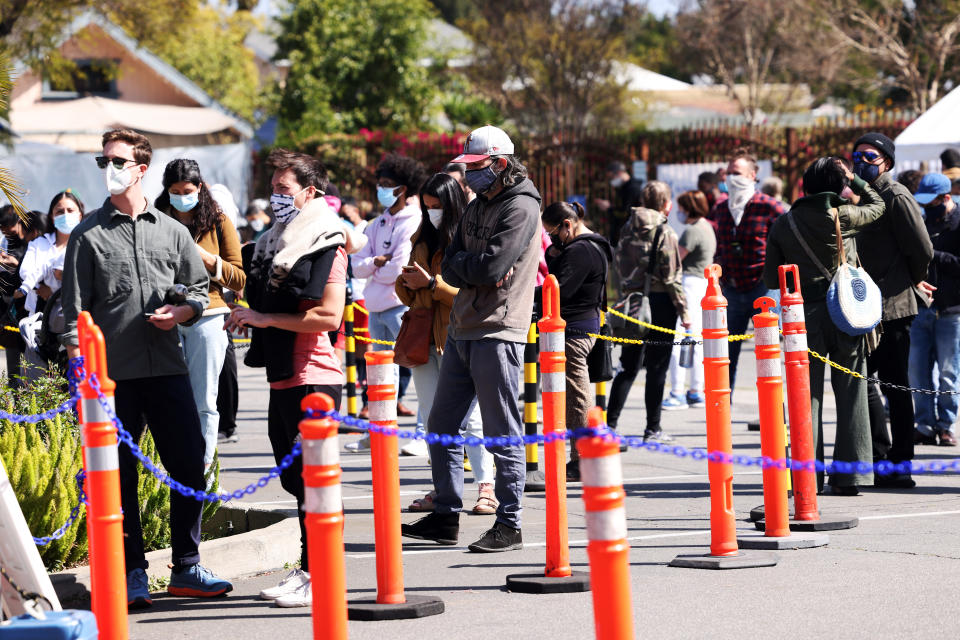 People wait in line to be vaccinated for the coronavirus at Kedren Community Health Center Inc. with a new initiative to expand vaccines to underserved communities in South LA  on Friday, March 26, 2021 in Los Angeles, CA. (Dania Maxwell / Los Angeles Times via Getty Images)