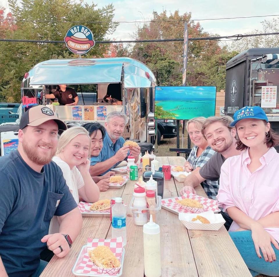 OTC Food Truck Village offers picnic tables for eating outdoors, along with heat lamps, string lights and cornhole boards to cultivate a welcoming atmosphere.