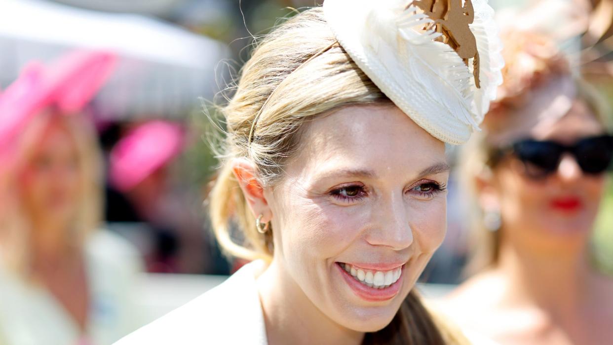 Carrie Johnson in a white outfit at Ascot