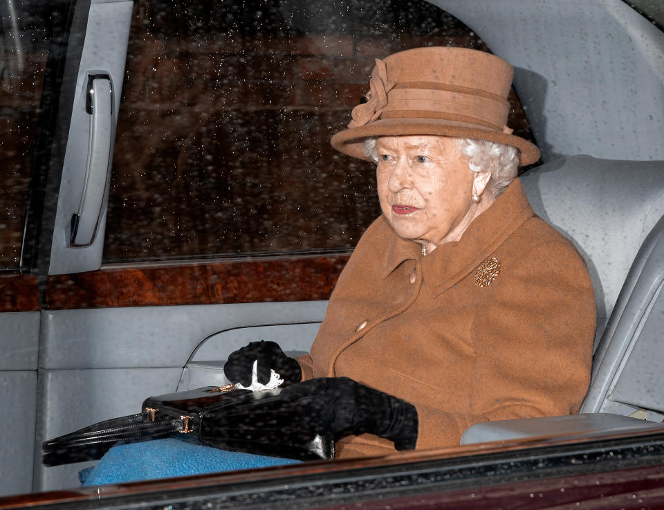 Queen Elizabeth II departs in her Bentley car after attending Sunday service at the Church of St Mary Magdalene on the Sandringham estate on January 12, 2020 in King's Lynn, England.