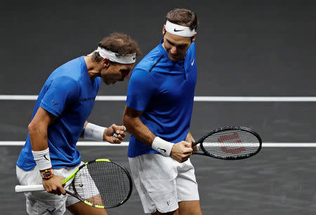 Tennis - Laver Cup - 2nd Day - Prague, Czech Republic - September 23, 2017 - Rafael Nadal and Roger Federer of team Europe react during the match. REUTERS/David W Cerny