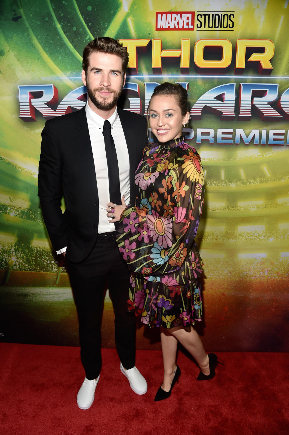 Liam Hemsworth and Miley Cyrus at The World Premiere of Marvel Studios' "Thor: Ragnarok" at the El Capitan Theatre on Oct. 10, 2017 in Hollywood, California.&nbsp;