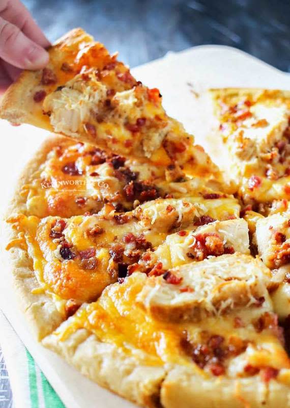 <p>Kleinworth & Co.</p><p>Grilled chicken and bacon pizza with garlic cream sauce is the best homemade pizza recipe ever! Better than any frozen, take & bake or delivery.</p><p><strong>Get the recipe: <a href="https://www.kleinworthco.com/grilled-chicken-bacon-pizza-with-garlic-cream-sauce/" rel="nofollow noopener" target="_blank" data-ylk="slk:Grilled Chicken Bacon Pizza with Garlic Cream Sauce;elm:context_link;itc:0;sec:content-canvas" class="link ">Grilled Chicken Bacon Pizza with Garlic Cream Sauce</a></strong></p>