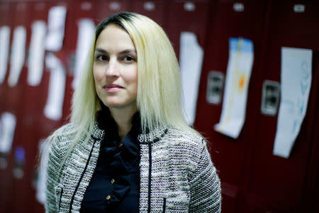 Former Sandy Hook teacher Kaitlin Roig poses for a picture during an active shooter training at James I. O'Neill High School in Highland Falls, New York, U.S., December 12, 2017. REUTERS/Eduardo Munoz