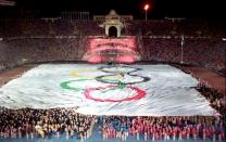 <p>One of the more dramatic opening ceremonies in Olympic history concluded with Paralympic archer Antonio Rebollo shooting an arrow into the Olympic cauldron. Contrary to belief, the arrow did overshoot the cauldron, though safety measures were in place to manage the risk of a flaming arrow reaching the crowd.</p>