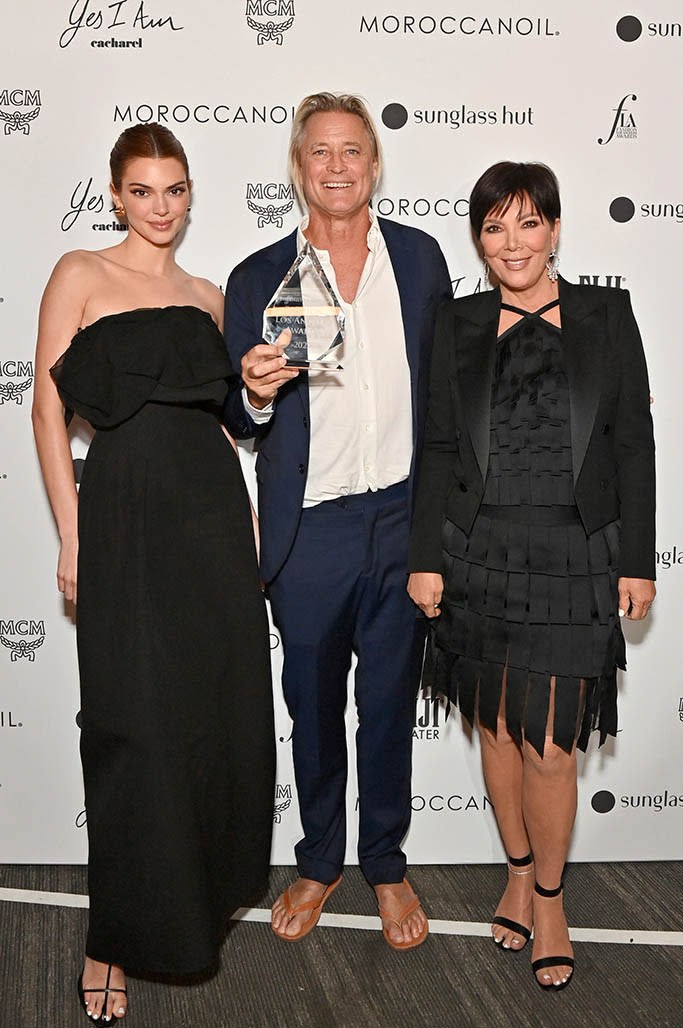 (L-R) Kendall Jenner, Russell James, recipient of the Lifetime Achievement award, and Kris Jenner pose backstage during the Daily Front Row’s Sixth Annual Fashion Los Angeles Awards on April 10, 2022 in Beverly Hills, Calif. - Credit: Getty Images for Daily Front Row