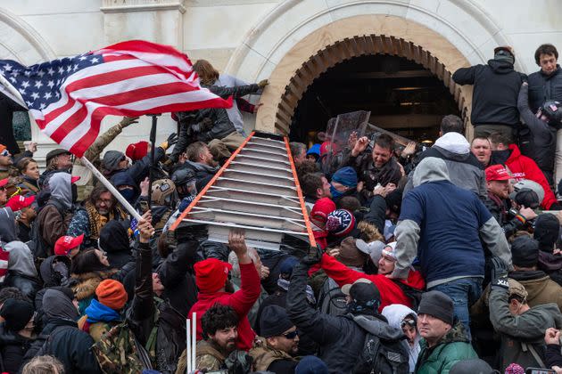 Rioters on clash with police while trying to enter the Capitol building on Jan. 6. (Photo: Pacific Press via Getty Images)