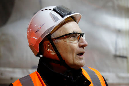 Vinci Chairman and Chief Executive Officer Xavier Huillard visits the site of the future metro stations "Aime Cesaire" and "Mairie d'Aubervilliers" as part of the line 12 extension in Aubervilliers near Paris, France, January 16, 2018. REUTERS/Charles Platiau