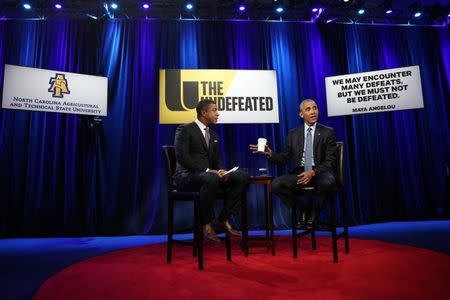 U.S. President Barack Obama attends a town hall interview with ESPN anchor Stan Verrett on "race, sports and achievements" at North Carolina Agricultural and Technical State University in Greensboro, North Carolina, U.S. October 11, 2016. REUTERS/Carlos Barria