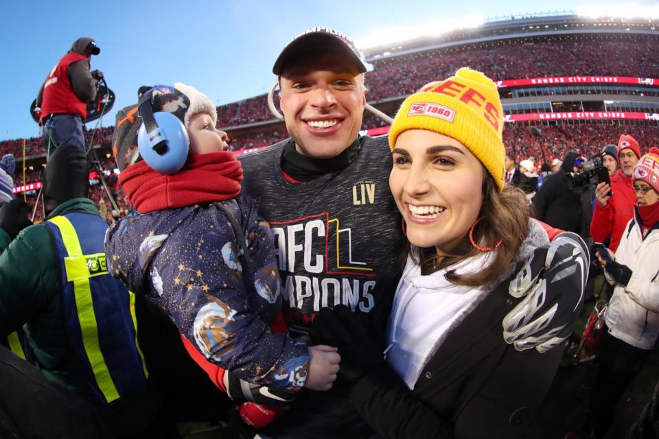 PHOTO: Harrison Butker, center, celebrates with his wife Isabelle and son James after defeating the Tennessee Titans in the AFC Championship Game at Arrowhead Stadium, Jan. 19, 2020, in Kansas City, Mo. (Tom Pennington/Getty Images, FILE)