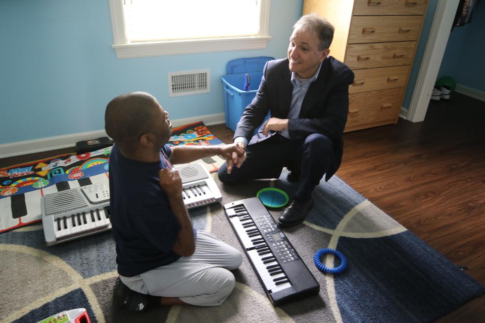 Former Ridgewood Mayor Paul Aronsohn meets with resident Tareem Gary at an Eastern Christian Children's Retreat group home in 2019. Aronsohn was appointed by Gov. Phil Murphy as the state's first Ombudsman for Individuals with Intellectual or Developmental Disabilities and their Families.
