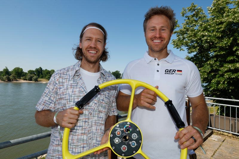 Sebastian Vettel (left) and Erik Heil (right) at the team announcement.
