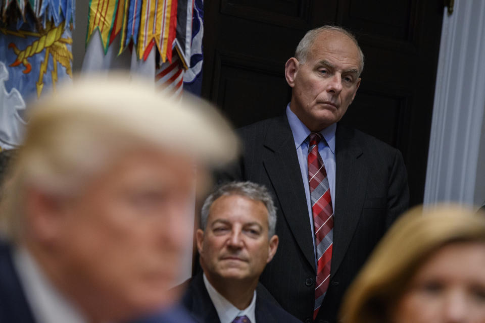 White House chief of staff John Kelly listens as President Trump speaks during a meeting on tax policy with business leaders in the Roosevelt Room of the White House, Oct. 31, 2017, in Washington. In his three months on the job, Kelly has been credited with bringing order to a chaotic West Wing, but don’t call him a moderate. (Photo: Evan Vucci/AP)