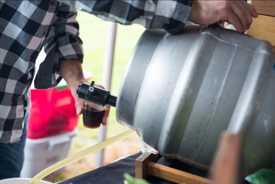 Guests are poured samples at BrewFest 2021.