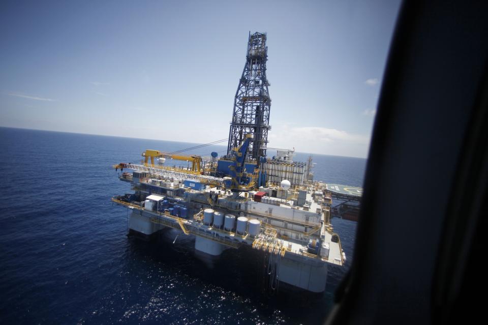 FILE - A deepwater rig Noble Danny Adkins is seen from Interior Secretary Ken Salazar's helicopter as he arrives to tour the rig in the Gulf of Mexico, off the coast of Louisiana on July 28, 2010. A new National Academy of Science study says that 13 years after a massive BP oil spill fouled the Gulf of Mexico, regulators and industry have reduced some risks in deep water exploration in the gulf but some troublesome safety issues persist. (AP Photo/Gerald Herbert, File)