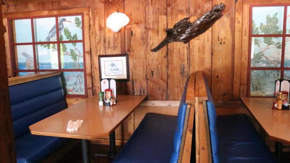 The walls of the Sea Hut Restaurant, 5611 U.S. 19, Palmetto, are lined with pecky cypress.