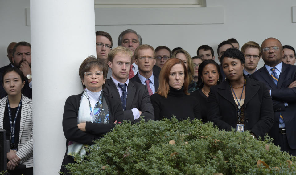 FILE - In this Wednesday, Nov. 9, 2016 file photo, staff members listen as President Barack Obama speaks about the presidential election results in the Rose Garden at the White House in Washington. On Friday, Nov. 8, 2019, The Associated Press reported on this AP photo circulating online accompanied by an incorrect identification of R. David Edelman as the whistleblower who led to the launch of the impeachment inquiry into President Donald Trump in 2019. Edelman left his position with the White House in 2017 before Trump’s inauguration. (AP Photo/Susan Walsh, File)