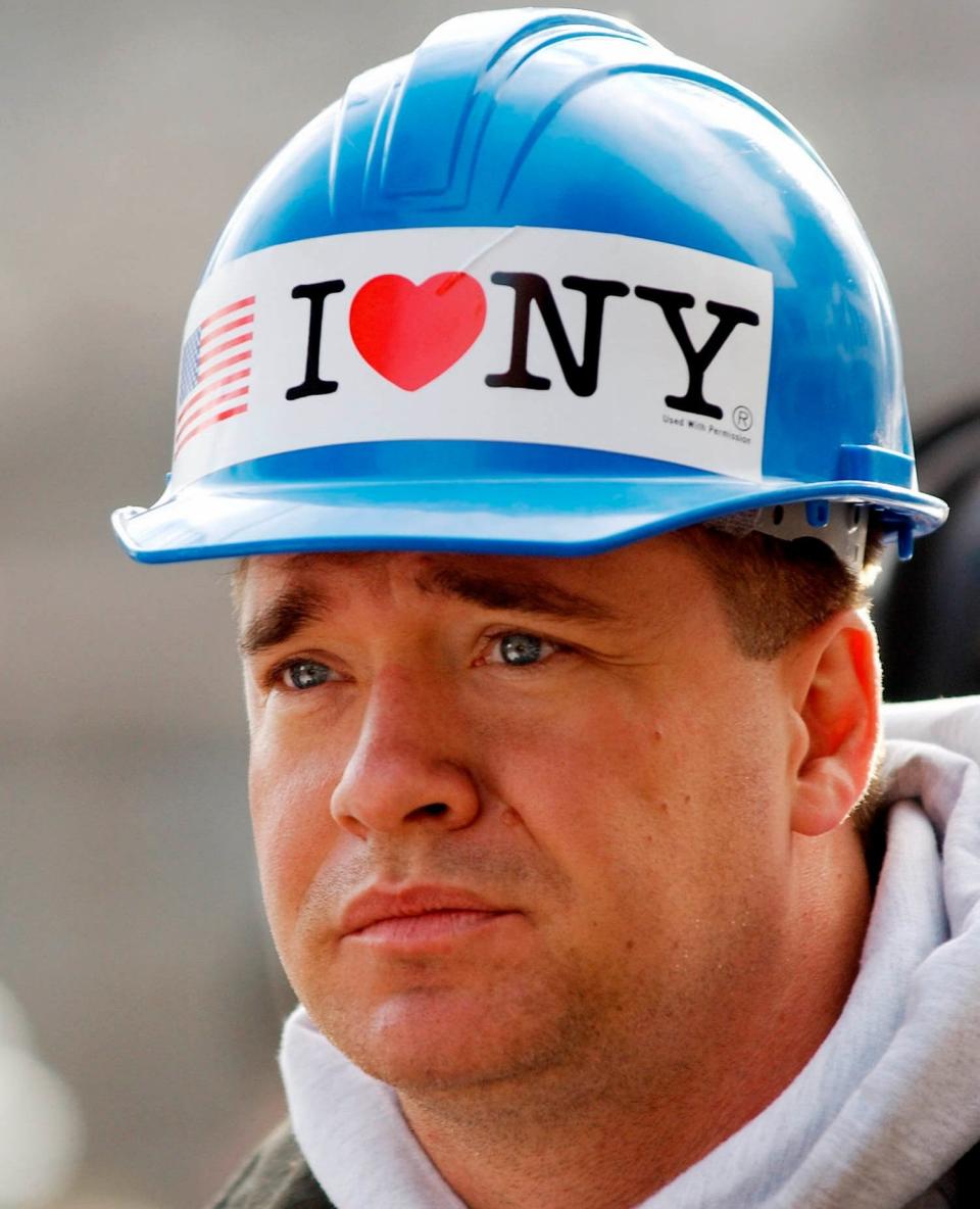 New York City firefighter Kevin Bohan at a memorial service near ground zero in New York - Stan Honda/AP Photo