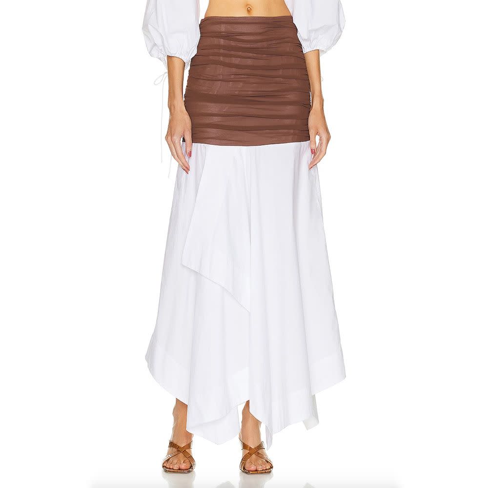 <p><a href="https://go.redirectingat.com?id=74968X1596630&url=https%3A%2F%2Fwww.revolve.com%2Fhelsa-cotton-poplin-skirt-with-sheer-overlay-in-white-brown%2Fdp%2FHLSA-WQ13%2F%3Fd%3DWomens%26page%3D1%26lc%3D37%26itrownum%3D10%26itcurrpage%3D1%26itview%3D05&sref=https%3A%2F%2Fwww.harpersbazaar.com%2Ffashion%2Ftrends%2Fg44536412%2Fbest-white-maxi-skirts%2F" rel="nofollow noopener" target="_blank" data-ylk="slk:Shop Now;elm:context_link;itc:0;sec:content-canvas" class="link rapid-noclick-resp">Shop Now</a></p><p>Cotton Poplin Skirt</p><p>$298.00</p><p>revolve.com</p><span class="copyright">Revolve</span>