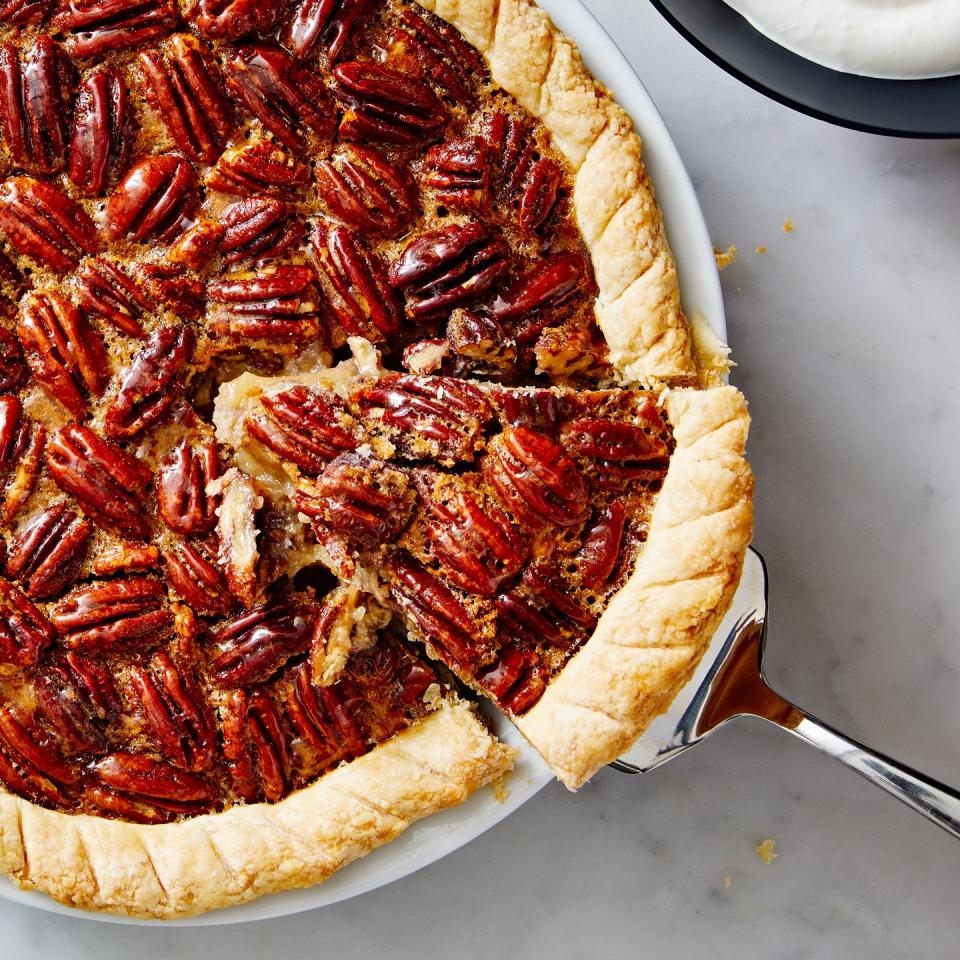 pecan pie with crunchy pecans and a flaky crust