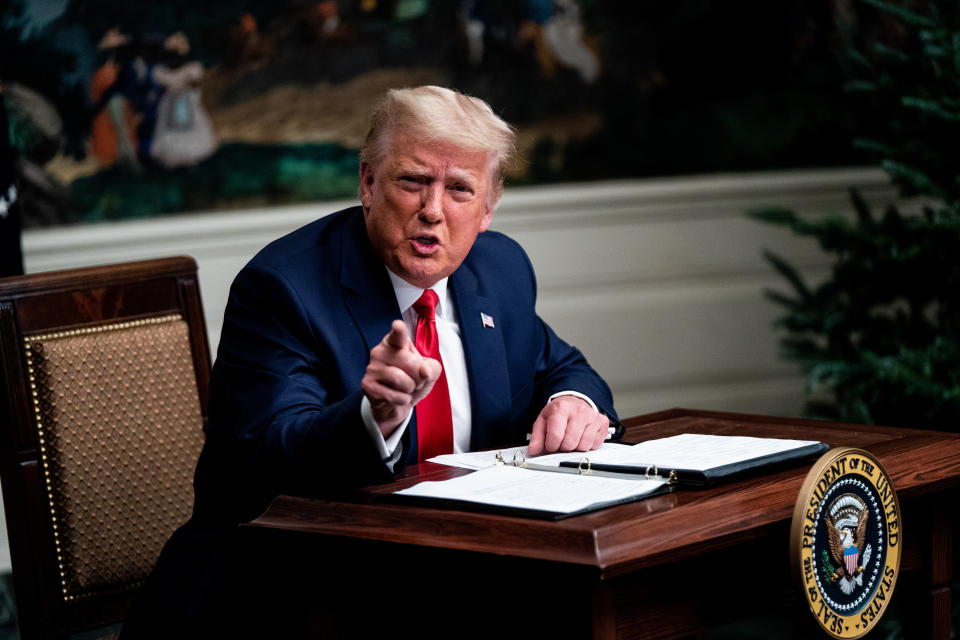 Donald Trump speaks during a videoconference with members of military in the Diplomatic Room of the White House in Washington, D.C., U.S., on Thursday, Nov. 26, 2020.