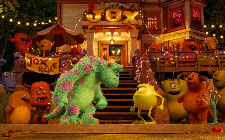 This film publicity image released by Disney-Pixar shows characters Sulley, center left, voiced by John Goodman, and Mike, center left, voiced by Billy Crystal in a scene from "Monsters University." (AP Photo/Disney-Pixar)