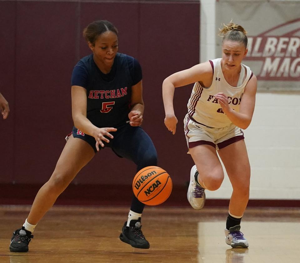 Ketcham's Nia Rencher (l) and Albertus Magnus's Allie Falesto (r) pursue a loose ball during Magnus's 54-47 win in girls basketball action at Albertus Magnus High School in Bardonia on Thursday, Feb. 8, 2024.