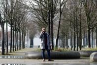 Syrian migrant Tareq Alaows poses during an interview with Reuters in Berlin