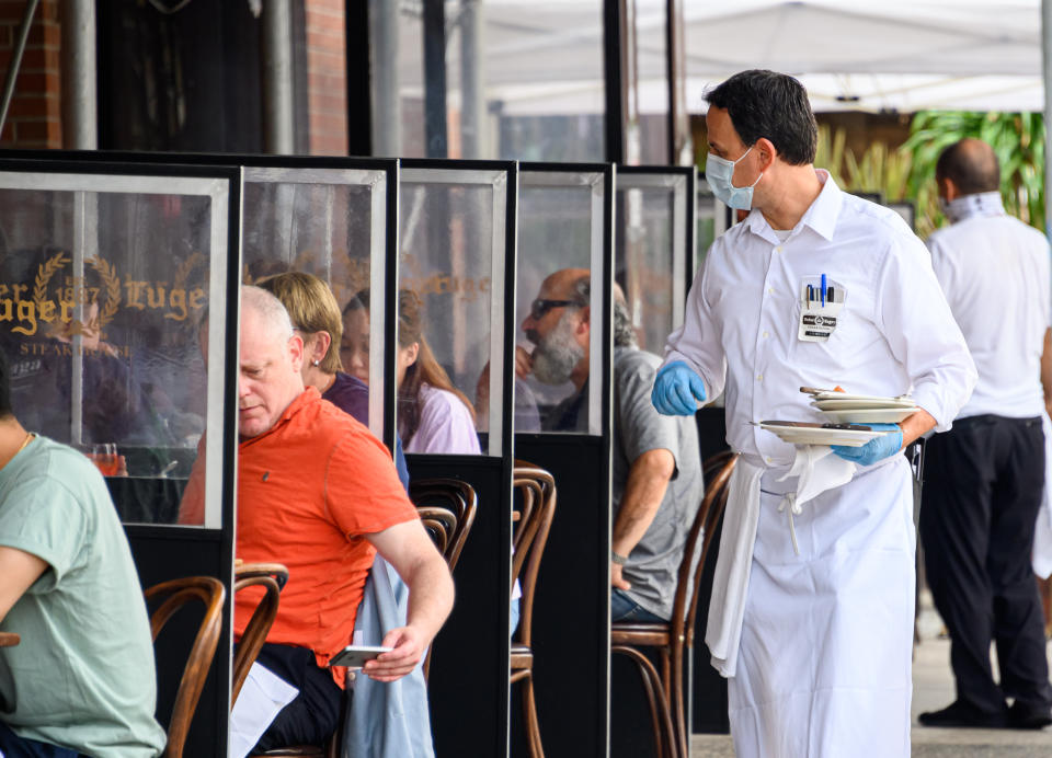 People dine outside Peter Luger Steakhouse in Williamsburg as the city continues Phase 4 of re-opening following restrictions imposed to slow the spread of coronavirus on September 10, 2020 in New York City. (Noam Galai/Getty Images)