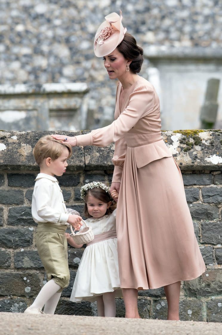 After being pictured having a serious chat with her son, George, the Duchess of Cambridge offers him some comfort [Photo: PA]