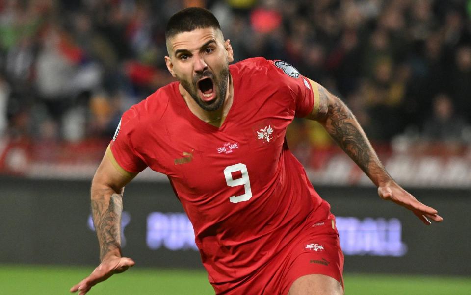 Serbia's forward Aleksandar Mitrovic celebrates scoring against Montenegro in Euro 2024 qualifying