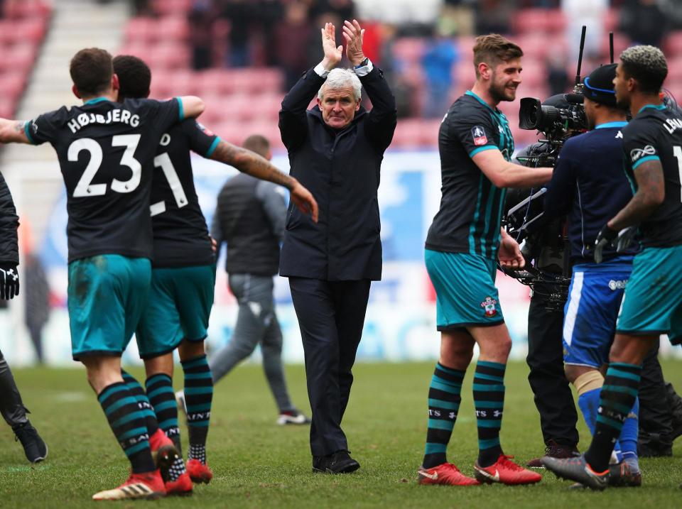 Mark Hughes applauds the Southampton supporters: Getty Images