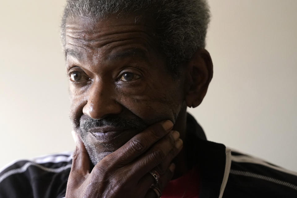 Steven Hamilton speaks to a reporter from The Associated Press, Wednesday, Sept. 28, 2022, in his newly acquired apartment, in Boston. Hamilton was homeless for over three years before moving into the apartment in September 2022. (AP Photo/Steven Senne)