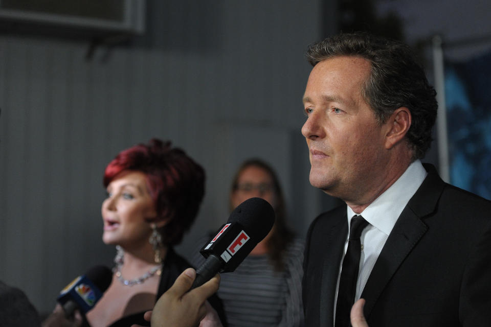 LOS ANGELES, CA - SEPTEMBER 14:  Piers Morgan (R) and Sharon Osbourne attend NBC's "America's Got Talent" season finale at CBS Studios on September 14, 2011 in Los Angeles, California.  (Photo by Noel Vasquez/Getty Images)