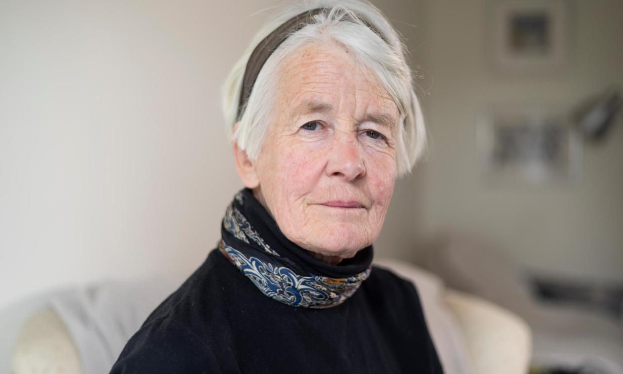 <span>Warner was arrested after standing outside court with her sign at the start of a trial of Insulate Britain protesters.</span><span>Photograph: Graeme Robertson/The Guardian</span>