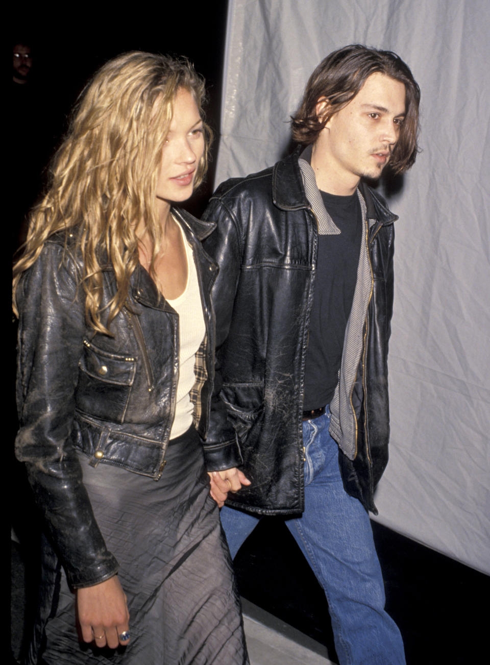 Kate Moss and Johnny Depp wearing leather jackets