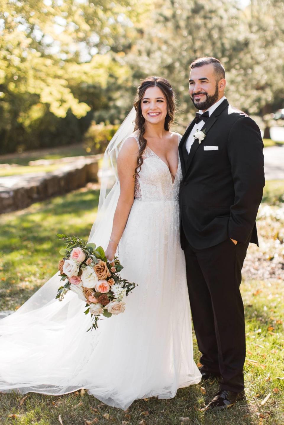 Kansas City lawyer Ivan M. Camejo, seen here with his wife, Haley, has been falsely identified by social media users as the man seen in a viral video defacing the Colosseum in Rome. People have been accusing Camejo online of the vandalism and sending him hate messages.