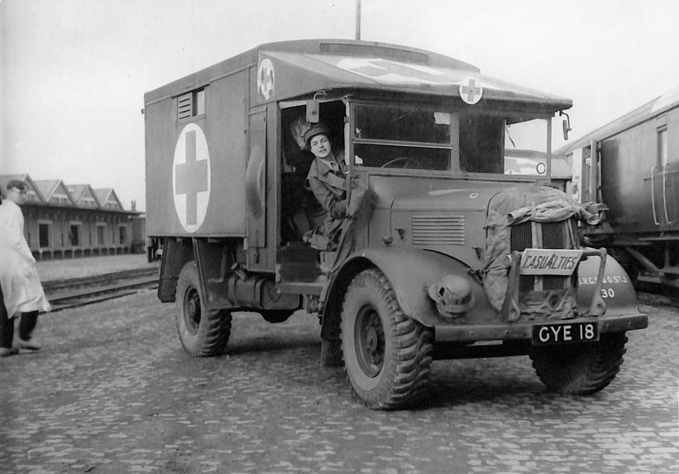 A black and white version of a British Red Cross female ambulance driver overseas after D-Day between 1944 and 1945 (British Red Cross/PA)