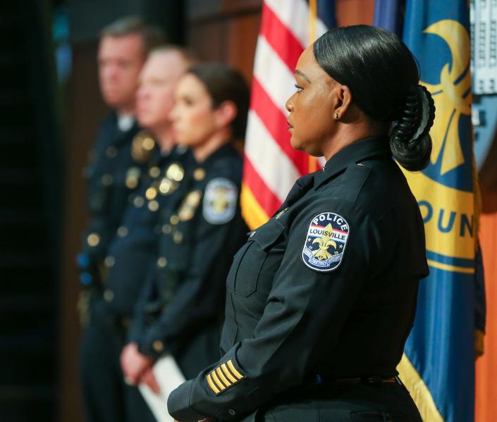 LMPD Interim Chief Jacquelyn Gwinn-Villaroel, listens as Mayor Craig Greenberg speaks during a press conference announcing additional information to be released about complaints surrounding LMPD officers and their conduct on Friday, May26, 2023